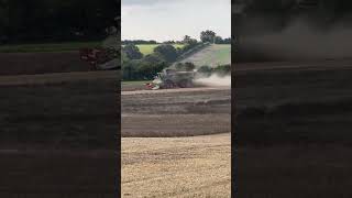 Combine Harvester on the South Downs in Southern England [upl. by Ennaeiluj]