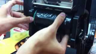 How to install film in TSC TA200 barcode printer [upl. by O'Doneven654]