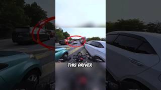 Car Gets Mad At Biker LaneSplitting [upl. by Yodlem]