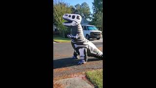 Guy wearing dinosaur costume falls over [upl. by Alleris]