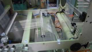 IZBH zipper bag attachment seal and cut bag making machine [upl. by Odlanier]