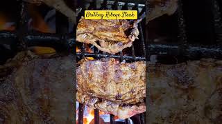 Grilling Ribeye Steak with Charcoal Grill grilling ribeye steak shortsfeed shorts [upl. by Shamrao]