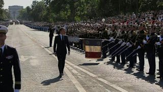 French President Macron takes part in Bastille Day military parade  AFP [upl. by Harolda]