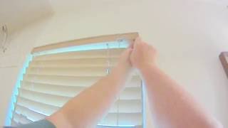 Blinds take down from window flipping tabs open [upl. by Orazal615]