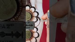 Beautiful mehndi design using blade and coins  video newkavyamehndishorts [upl. by Lounge]