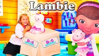 Unboxing the Doc McStuffins Take Care of Me Lambie Toy with the Assistant [upl. by Airdnaz42]