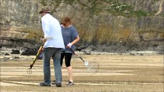 Sand artist creates crop circle on Brean beach [upl. by Eenafit]