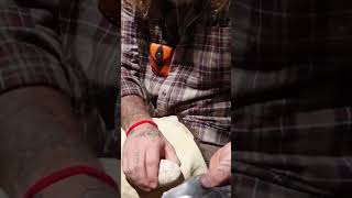 Flintknapping  Thinning A Stone Spall flintknapping stonetools caveman [upl. by Ajidahk392]