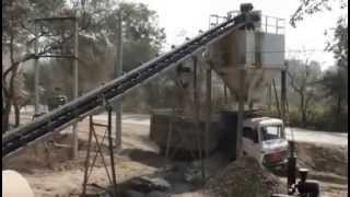 Efficient mixing by pug mill unit of wet mix macadam plant [upl. by Tella121]