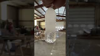 Slow motion instant freezing of a water bottle [upl. by Yrellih]