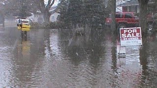 Flooding In Alpena Michigan Thawing Snow And Rain Floods Roads [upl. by Lux]