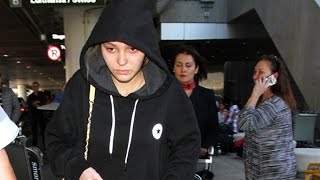 LilyRose Depp Pulls Her Hood Up At LAX [upl. by Pokorny]