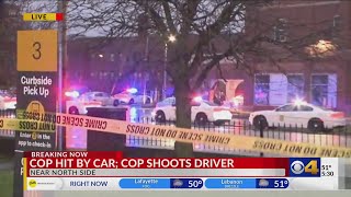 DEVELOPING Near north side OIS — cop hit by car cop shoots driver [upl. by Legir15]