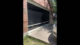 A garage workshop outfitted with our motorized shade in Austin TX garagemakeover austin [upl. by Hogan]