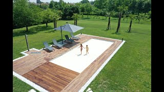 Copertura automatica a tapparella per piscina interrata e Decking perimetrale in legno di IPE [upl. by Madriene]