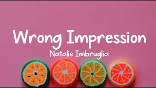 Natalie Imbruglia  Wrong Impression LYRICS [upl. by Aletse]