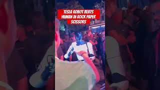 Tesla Robot Defeats Human in Rock Paper Scissors Showdown [upl. by Neladgam]