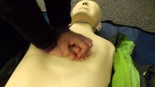 Chest compressions on a CPR dummy [upl. by Claudius]