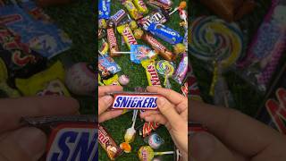 Chocolate snickers Satisfying video Asmr lollipop satisfying snickers asmrvideo bounty kitkat [upl. by Yrakaz]