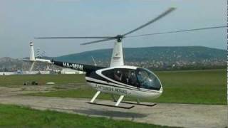 A Robinson R44 starting its engine and taking off from the Budaörs airfield [upl. by Zavras]