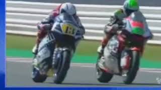 Crazy moment Moto2 rider Romano Fenati grabs brake lever of Stefano Manzi during race [upl. by Yrruc737]