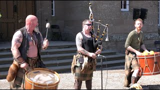 When The Clans Unite by Scottish tribal band Clann An Drumma in front of Scone Palace Scotland [upl. by Jorie]