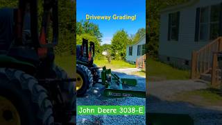 Driveway Grading with a JD 3038E and land plane [upl. by Slifka]