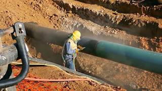 PIPELINE SANDBLASTING inside bell hole [upl. by Cralg]