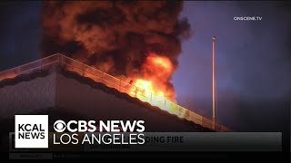 Firefighters search for possible victims as historic San Bernardino building goes up in flames [upl. by Alaet442]