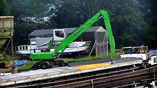 Umschlagbagger Sennebogen 830 in Fresenburg  Material handler Sennebogen 830 [upl. by Ardnauq]