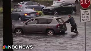 WATCH NBC reporter pushes car out of water as severe flooding hits South Florida [upl. by Gale732]