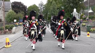 Scottish pipe band marches as the Lonach Pipe Band march to the 2018 Braemar Gathering in Scotland [upl. by Nosraep635]