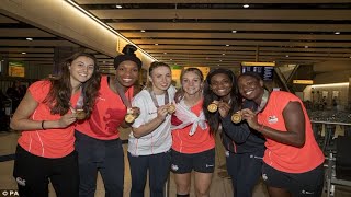 England womens netball team show off gold medals as Commonwealth Games stars arrive back to [upl. by Ydnolem794]