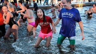 Polar Bear Plunge cofounder introduces daughter to the cold waters [upl. by Xirtaeb]