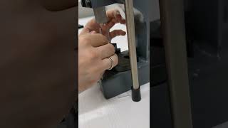 Using an arbor press to press fit rods into the Jubilee tool post for the OT2 Pipette Tool [upl. by Braeunig617]