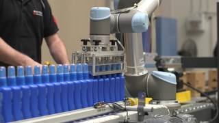 Case Packing and Palletising at Baxter Laboratories [upl. by Drallim848]