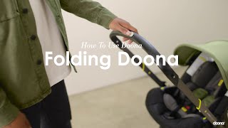 How to fold the Doona   Doona  Car Seat amp Stroller [upl. by Aivatan]