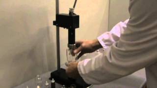 Perfume Spray Pump Crimper  Bench Mounted  How to use demonstration [upl. by Berkley]