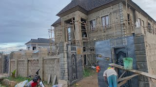 Building in Nigeria  Window hood design  Front gate pillar design  External wall plastering [upl. by Aikan351]