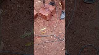 Making pieces of laterite brickhardwork constructionsite contructionwork constructionworker [upl. by Patterman]