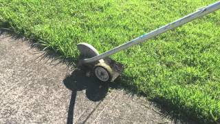 Edging a lawn with a stick edger [upl. by Adlihtam]