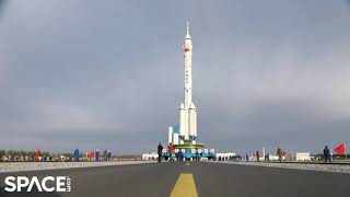 Chinas Long March 2F rocket rolled out for new space station crew launch [upl. by Lombardy358]