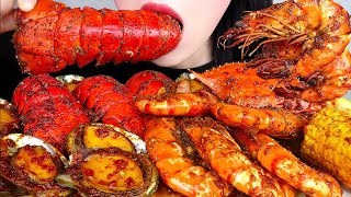 Asmr seafood boil mukbang lobster tail shirmp carb abalone sausage corn potatoes eattting sound [upl. by Nosraep235]