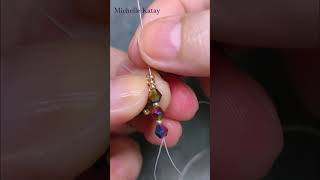 How to make beaded earrings 1 minute making earrings with bicone beads [upl. by Allicserp]