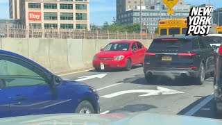 WATCH Brooklyn motorist caught driving backwards on FDR Drive in wild moment [upl. by Eldnik]