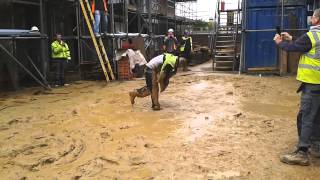 Funny Stunt by Construction Worker Labourer Callum throws himself into sloppy Mud on Building site [upl. by Howlend]