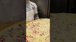 Part three of making the worlds largest pizza pizza worldsbiggest shorts food worldrecord [upl. by Llenyt]