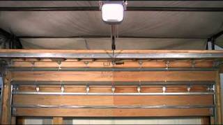 Genie garage door opener lifts heavy windload rated door [upl. by Freiman]