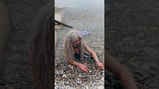 Mermaid looks for Petoskey Stones on the beach shorts [upl. by Nosdrahcir847]