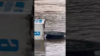 Ice machine floating along flood water at Sedgefield Country Club [upl. by Annail]